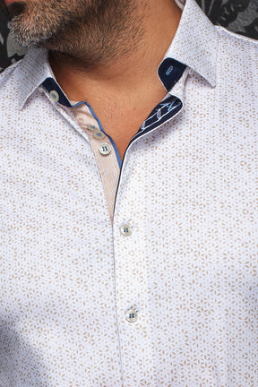 Au Noir men's white patterned button-up shirt collar with navy and beige contrast placket details, close-up
