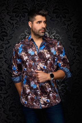 Men's brown abstract print button-up shirt on model, with blue accents and rolled contrast cuffs, front view by Au Noir