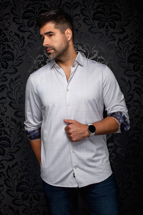 Au Noir men's light gray patterned button-up shirt angled on model, sleeves rolled to show contrast cuffs, side view