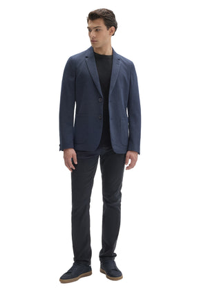 Men's full front view of navy textured sport blazer worn open over a black crewneck with dark pants by Robert Barakett