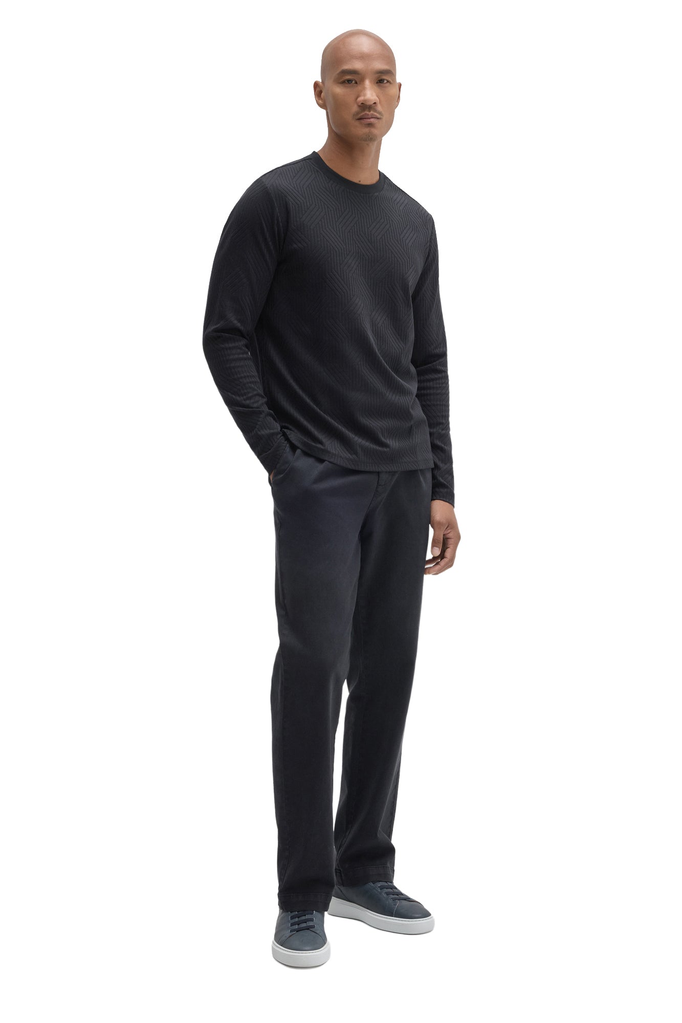 Robert Barakett men's angled full-body view of black long sleeve crew neck T-Shirt with tonal geometric texture, side view