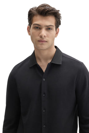 Robert Barakett men's close front view of black knit long-sleeve shirt with tonal button front and ribbed collar