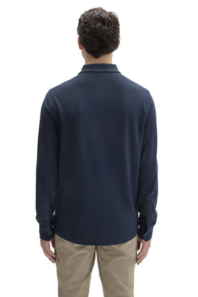 Robert Barakett men's navy long sleeve knit shirt with curved hem, buttoned cuffs and ribbed collar shown from the back