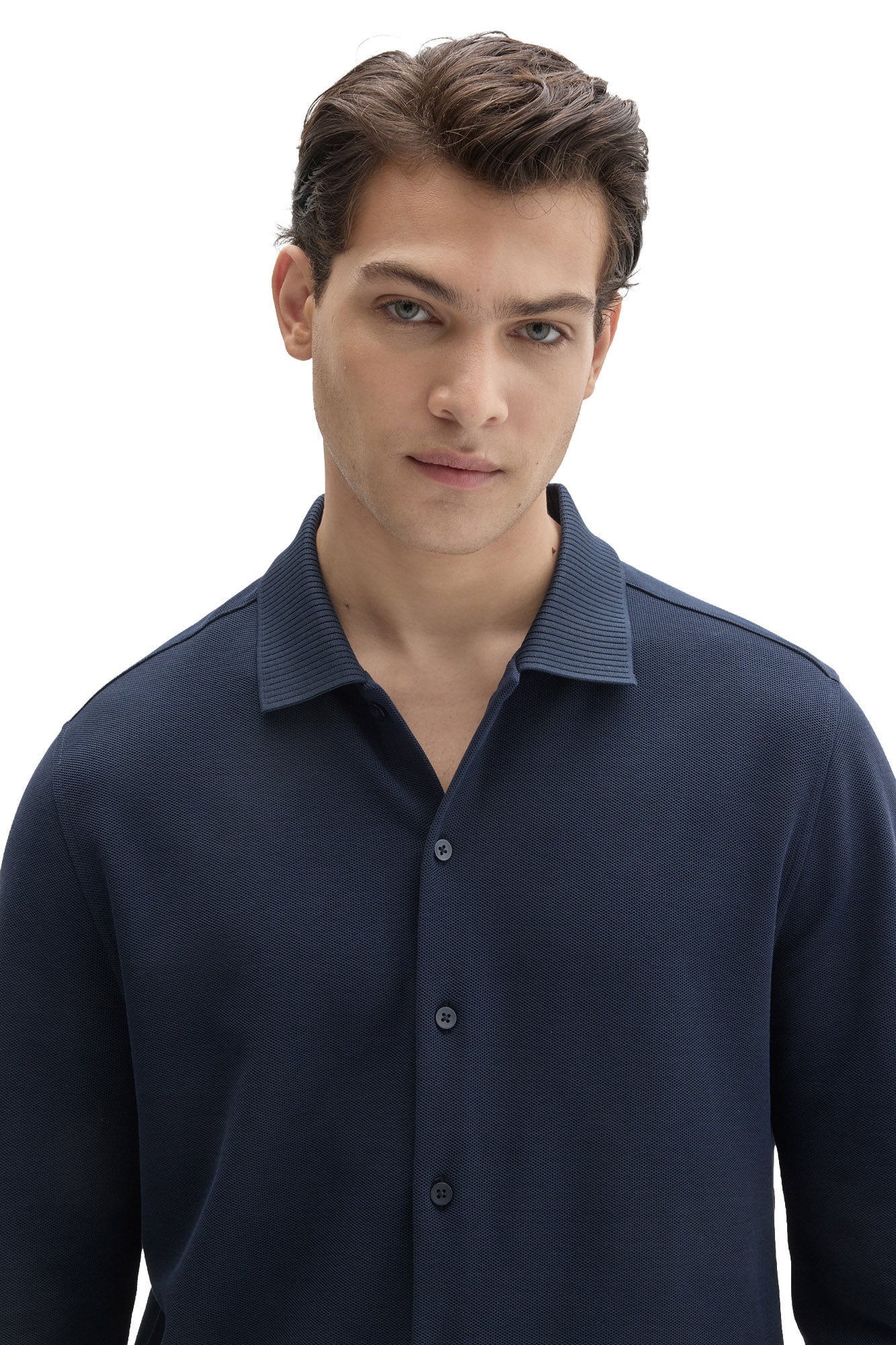 Men's close front view of navy knit long-sleeve knit shirt showing button placket and ribbed collar by Robert Barakett