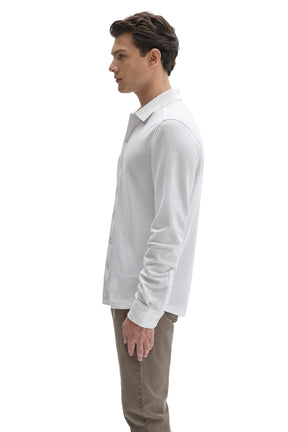 Robert Barakett men's white long sleeve knit shirt with ribbed collar and button cuff shown from the side