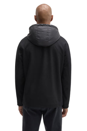 Robert Barakett men's black hooded jacket with plain long sleeves and charcoal padded hood shown from the back