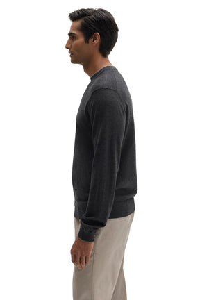 Robert Barakett men's charcoal long sleeve knit sweater showing ribbed hem and the straight fit, side view