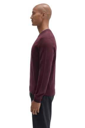 Side view of men's burgundy long sleeve crew neck sweater with ribbed hem and cuffs by Robert Barakett