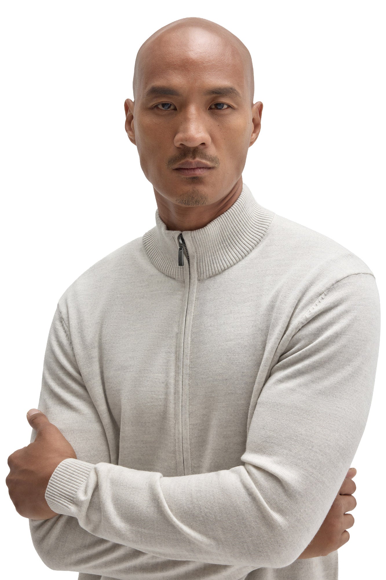 Men's close front view of a light beige full-zip knit long-sleeve knit sweater with ribbed stand collar by Robert Barakett