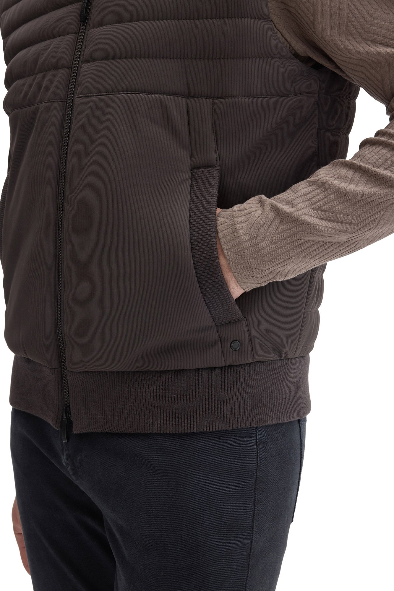 Men's pocket detail on dark taupe quilted vest with front zipper and rib-knit trim by Robert Barakett