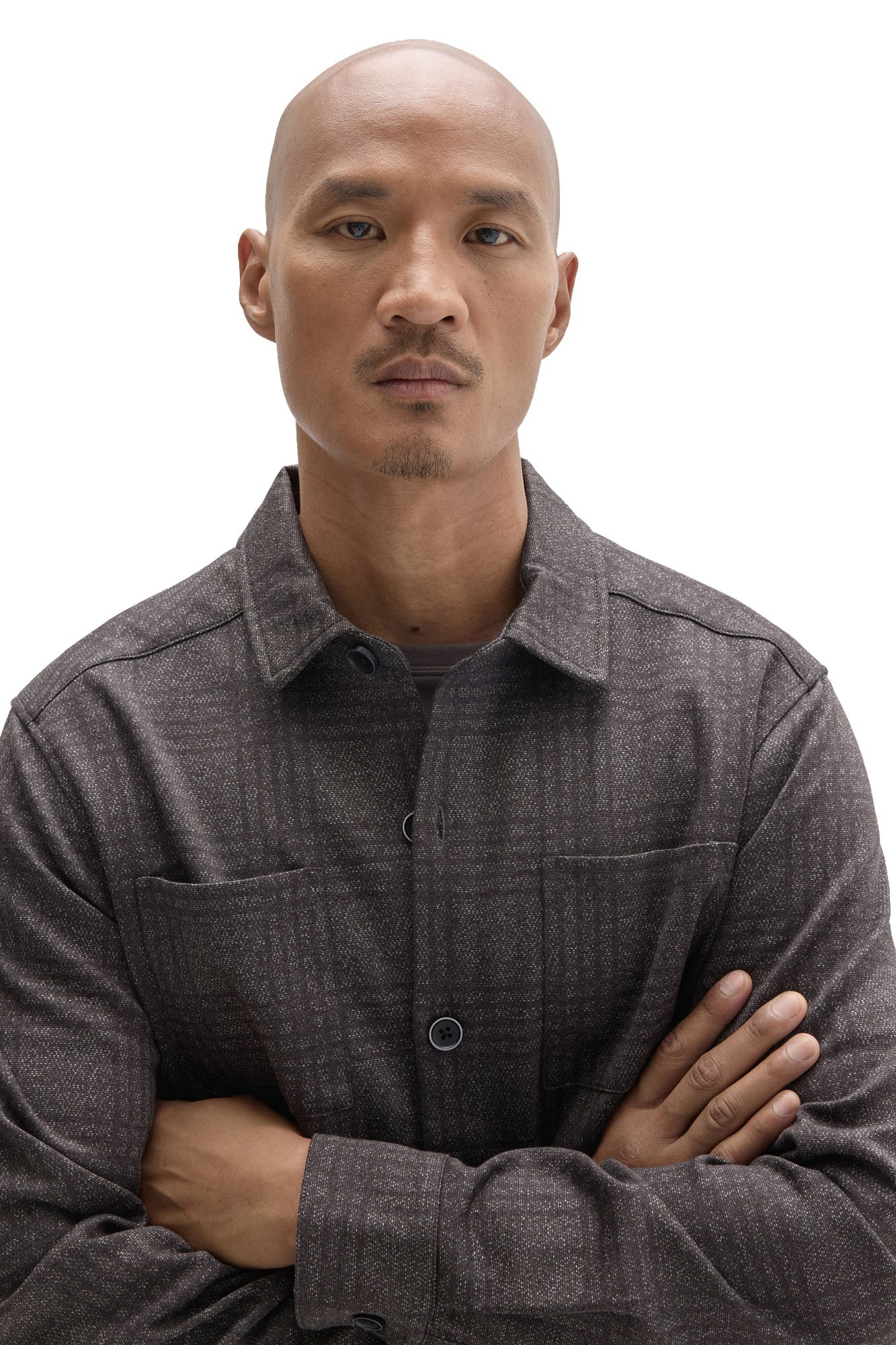 Robert Barakett men's close detail of charcoal plaid overshirt with dark buttons, chest pockets and point collar
