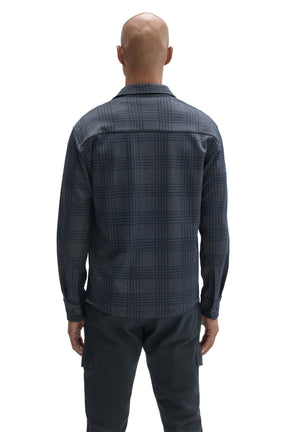 Robert Barakett men's dark blue plaid overshirt with button cuffs and rear yoke seam shown from the back