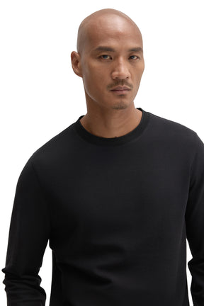 Robert Barakett men's close-up front view of black long sleeve T-Shirt with fine textured knit surface and crew neck