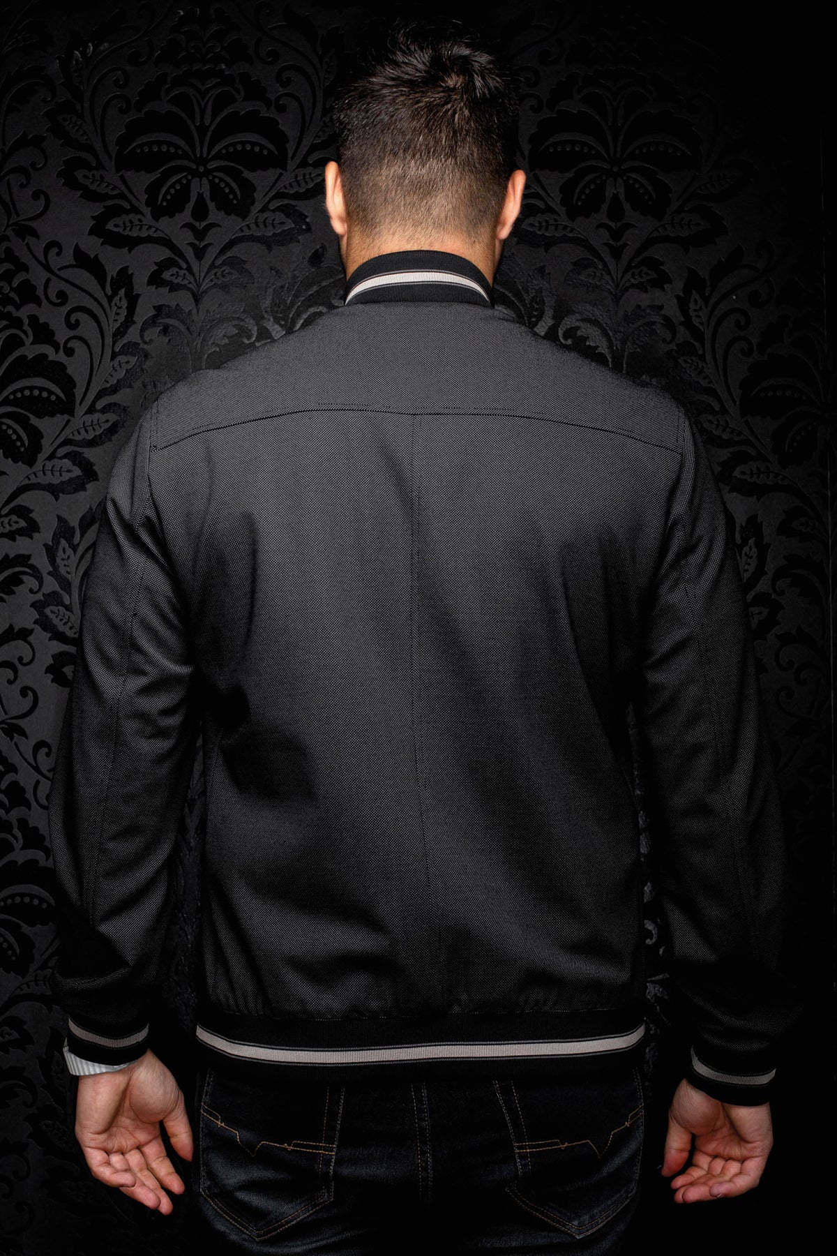 Au Noir men's black textured bomber jacket with striped rib collar, cuffs, and hem, back view