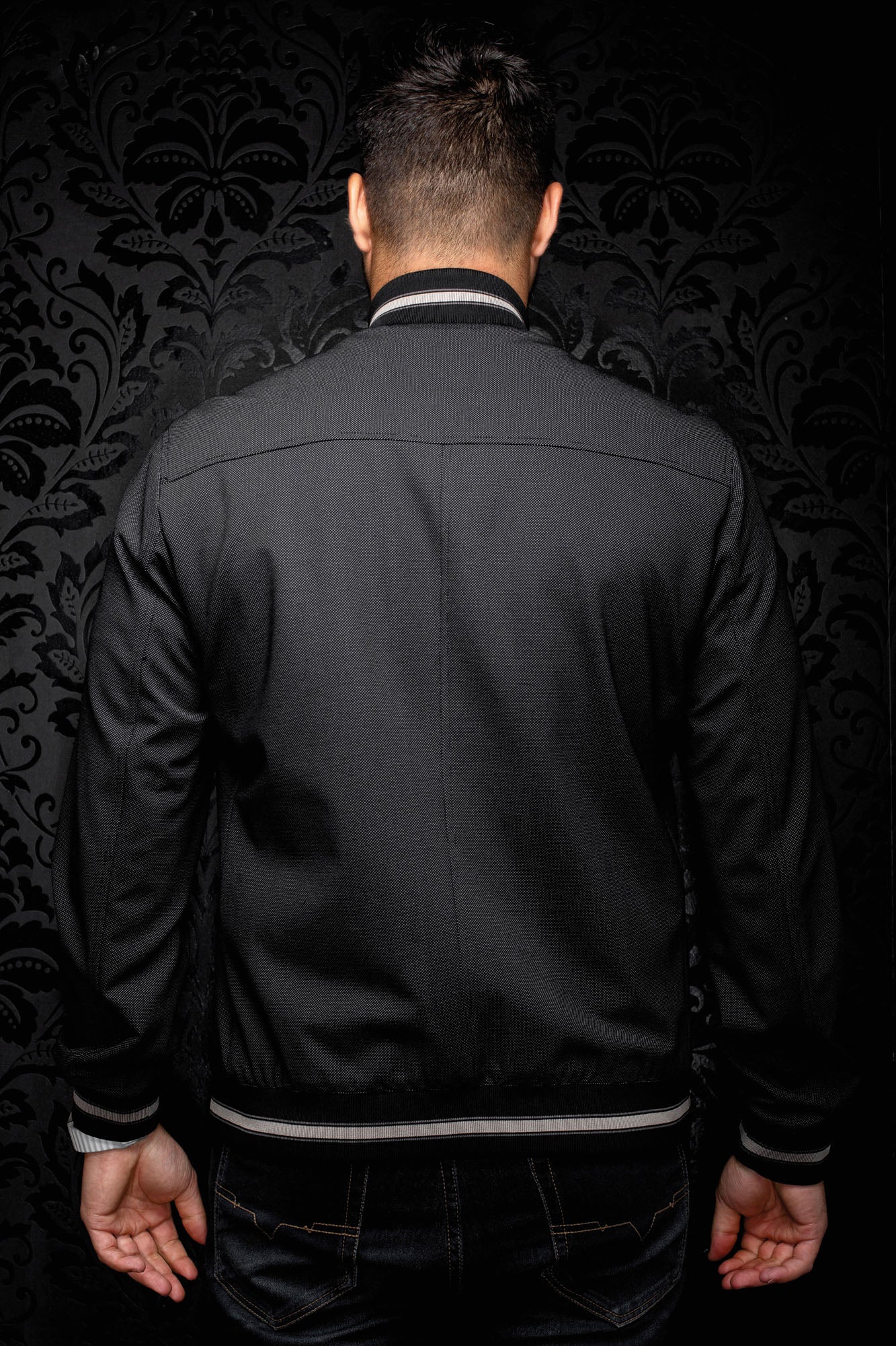 Au Noir men's black textured bomber jacket with striped rib collar, cuffs, and hem, back view