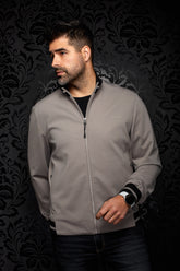 Men's gray bomber jacket front view zipped, with black ribbed trim, striped cuff, and chest logo by Au Noir