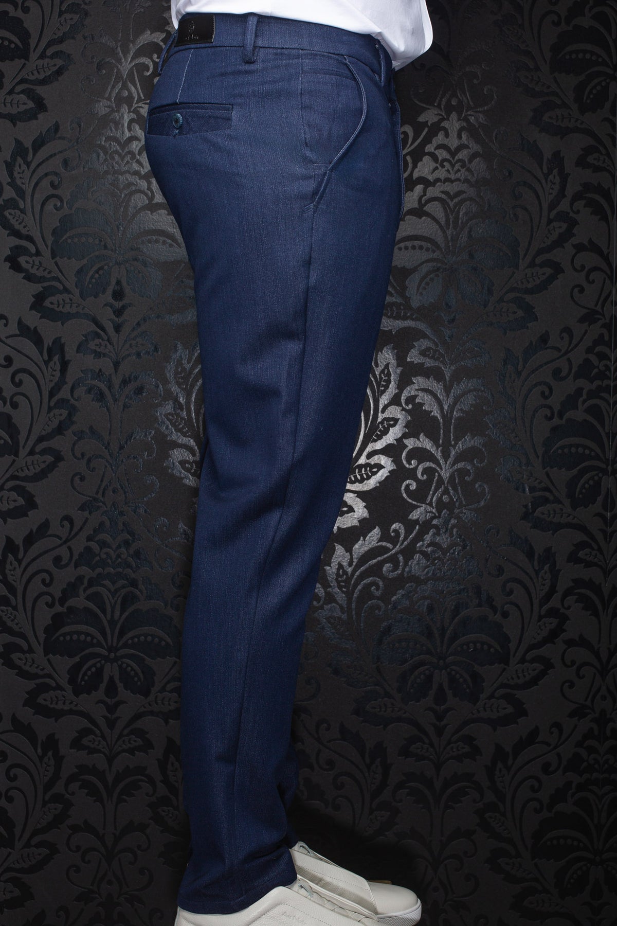 Au Noir men's dark navy pants with belt loops, welt back pocket and subtle woven sheen, side view
