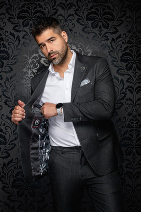 Men's open dark charcoal blazer showing patterned lining, red stitching, and interior label detail by Au Noir