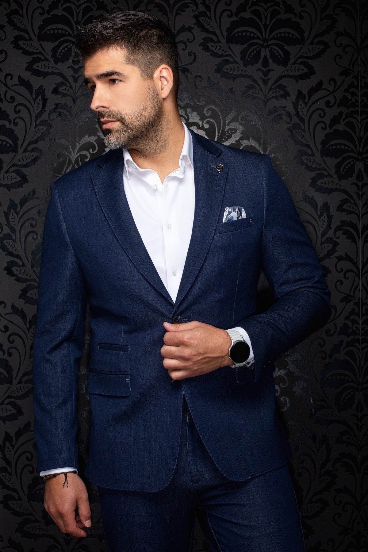 Au Noir men's navy blazer on a model, clear front view with notch lapels, one-button closure, and flap pocket
