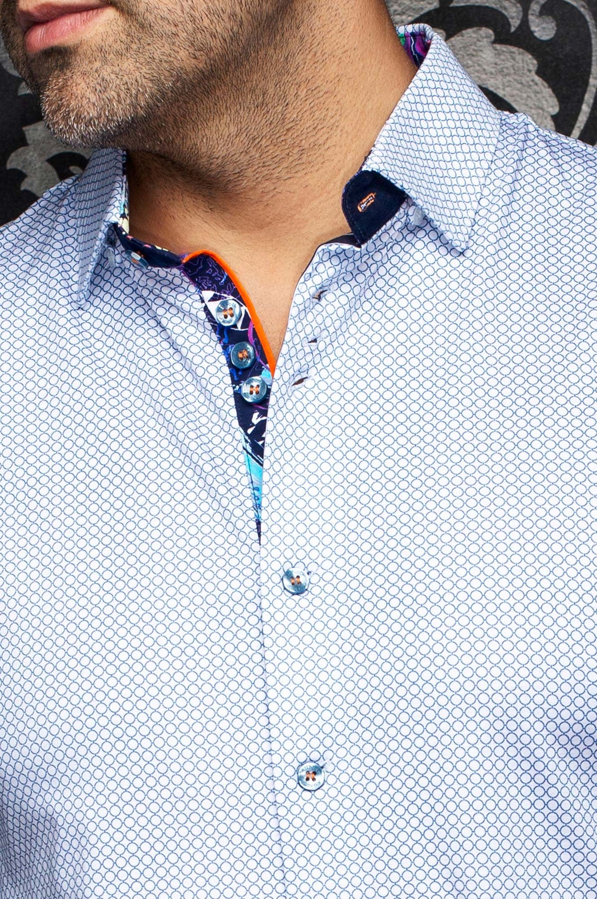 Au Noir men's white shirt with blue circle print, contrast inner placket, orange piping and buttons, close view