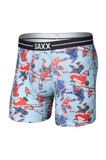 Men's light blue hockey print boxer briefs with black SAXX waistband, isolated front view