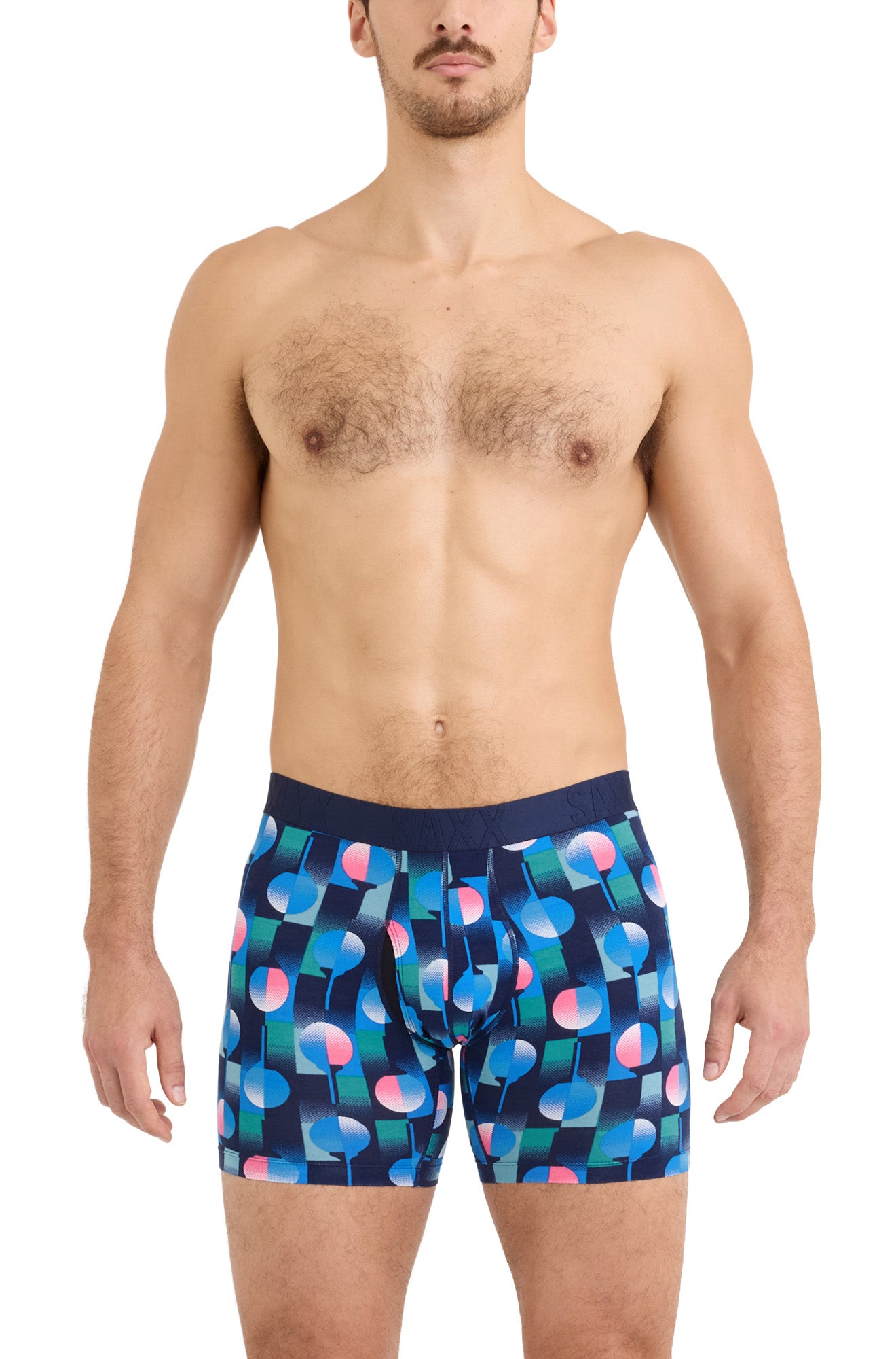 Men's navy printed boxer underwear with fitted legs and wide tonal SAXX waistband shown from the front