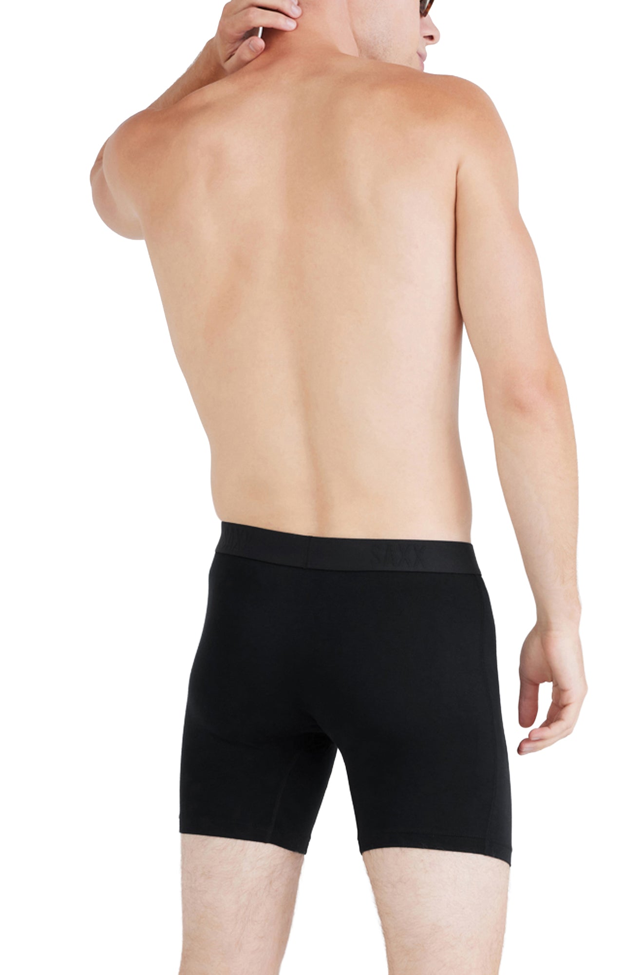 Saxx men's black boxer underwear with mid-thigh legs and wide elastic waistband shown from the back