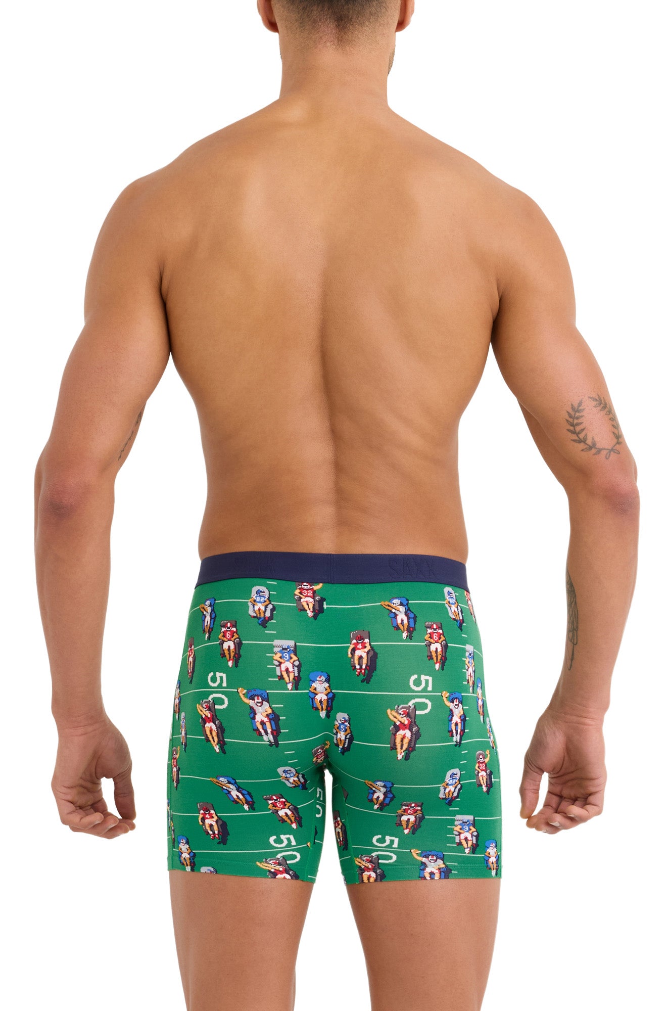 Saxx men's green football-print boxer briefs with straight hems and navy waistband, back model view