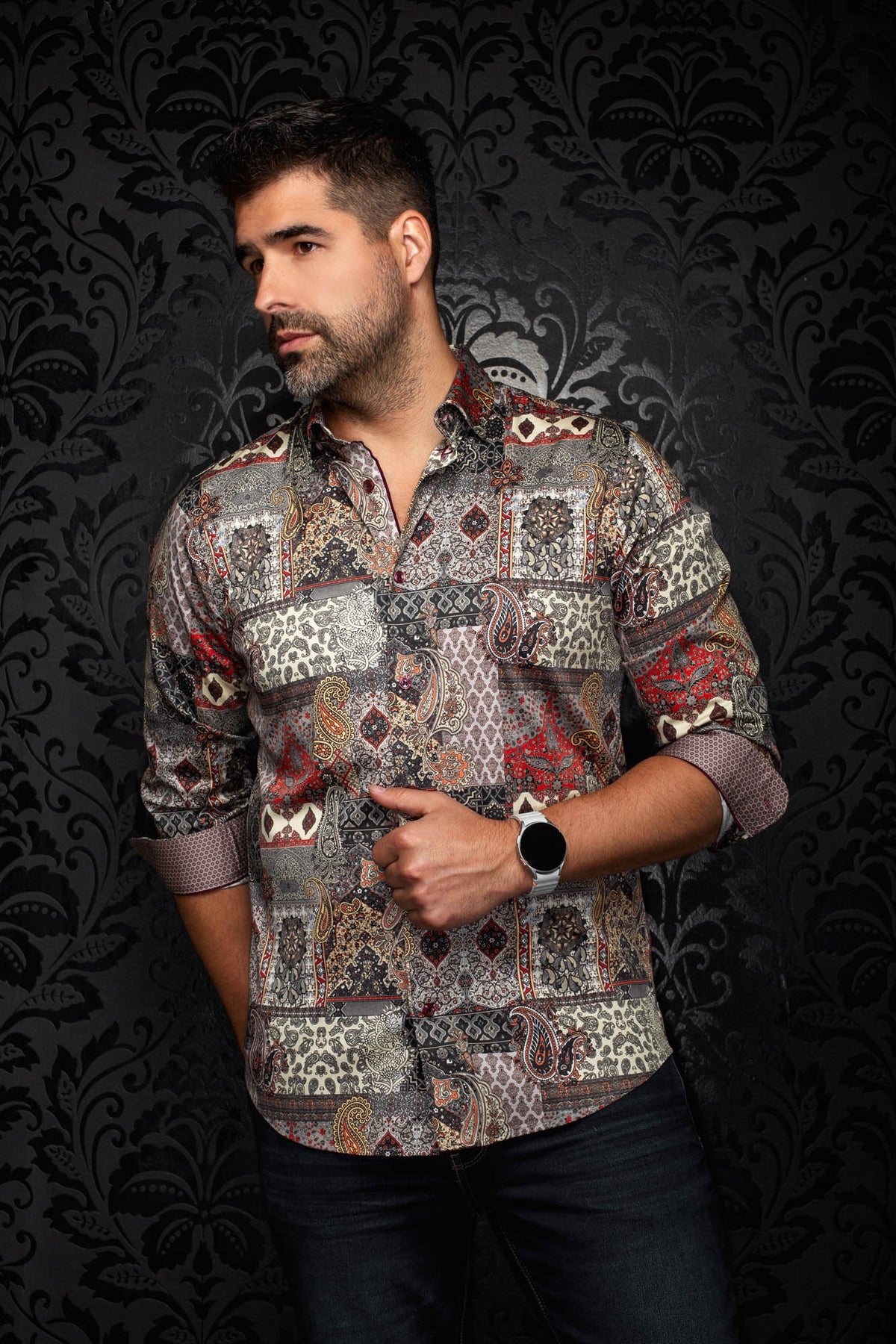 Men's angled front view of multicolor paisley shirt with rolled cuffs showing contrast inner print by Au Noir