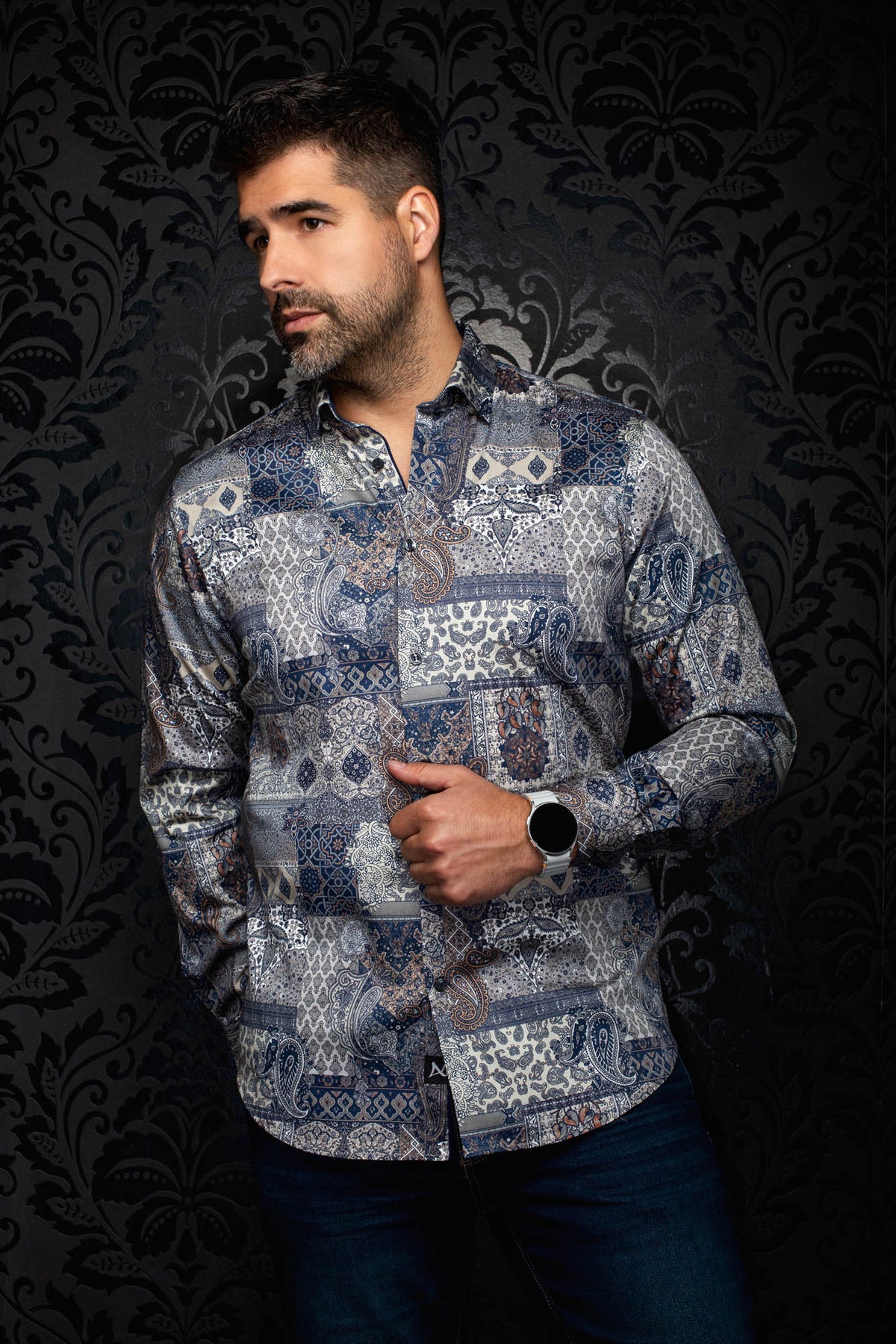 Au Noir men's navy paisley patchwork button-up shirt with spread collar and curved hem, front view