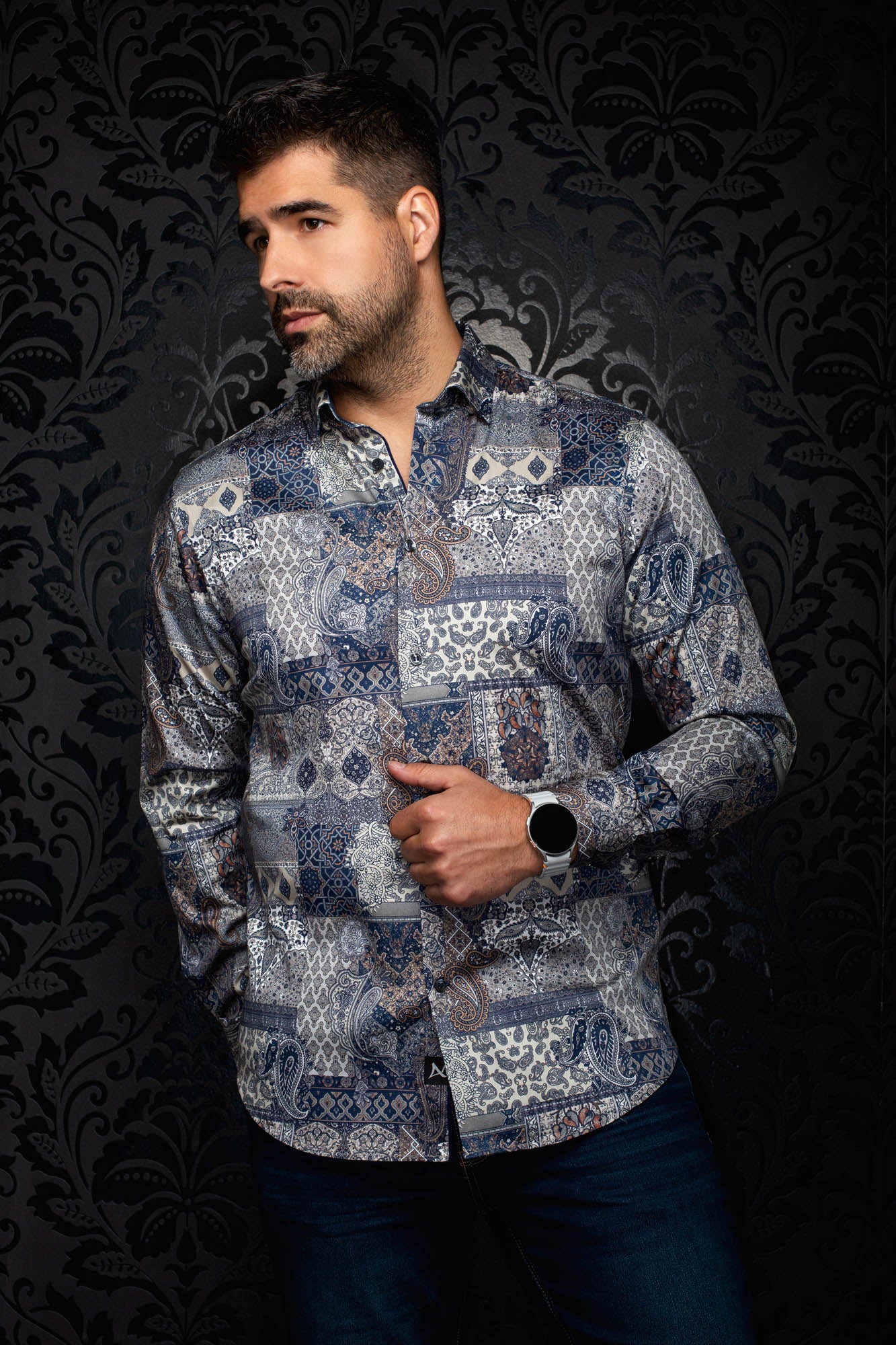 Au Noir men's navy paisley patchwork button-up shirt with spread collar and curved hem, front view