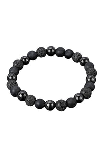 Men's black beaded bracelet with matte, glossy, and porous textured round beads on white, product view by Au Noir