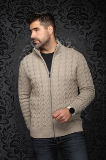 Men's beige cable-knit zip merino sweater shown front on model, with stand collar and ribbed hem by Au Noir